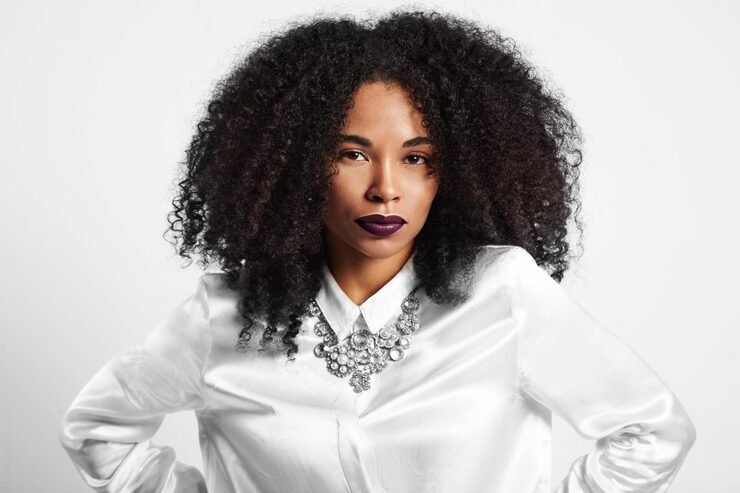 serious-black-woman-with-violet-lips_633478-2386